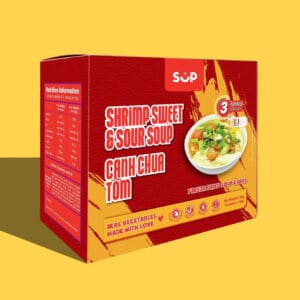 A colorful packaged Shrimp Sweet and Sour Soup labeled "shrimp sweet & sour soup canh chua tom" with nutritional information and an image of the soup on a yellow background.